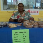 Dolores Bryant, an educational aide at Hendley Elementary School, selling baked goods to raise money for the school.