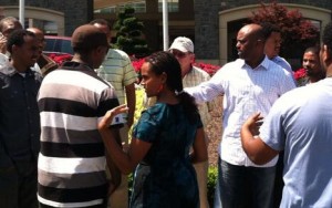 Fisseha Tesfaye and other drivers gather outside Gaylord National before delivering a letter calling for the hotel to provide a taxi stand in view of hotel guests